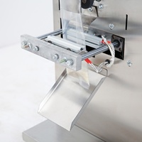 Máquina de paquete pequeño para pequeñas empresas Precio de bajo costo de una máquina de paquete de pie de té de azúcar Máquina de envasado de semillas de calabaza