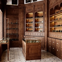 Vitrine de présentation de parfums en bois massif avec éclairage LED, présentoir de parfums en verre trempé à vendre