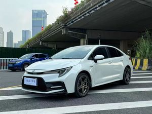 <span class=keywords><strong>Toyota</strong></span> <span class=keywords><strong>Corolla</strong></span> <span class=keywords><strong>Hybride</strong></span> <span class=keywords><strong>2021</strong></span> 1.8L Édition <span class=keywords><strong>Sport</strong></span> Cuir Foncé Extérieur Blanc Phares LED Pleine Grandeur Noirs Régulateur de Vitesse Adaptatif R17 - Product Image 2