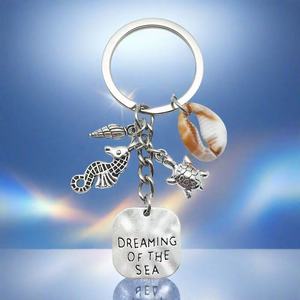 Phong cách biển ốc kim loại Keychain tùy chỉnh logo Quà tặng khuyến mãi túi thời trang hợp kim kẽm Keyring cho du lịch quà lưu niệm - Product Image 2