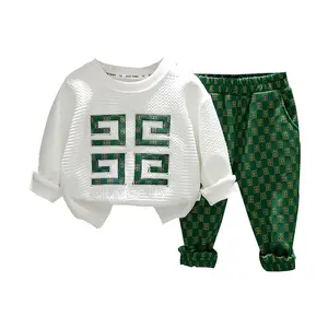 2024 nuevo bebé moda patrón geométrico ropa Casual niños Unisex Cool pulóver camisa y pantalones conjuntos