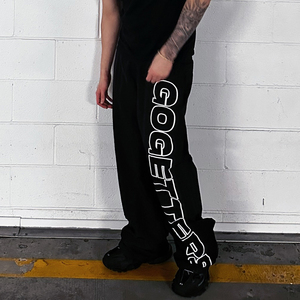 Pantaloni da ginnastica in Nylon <span class=keywords><strong>larghi</strong></span> <span class=keywords><strong>larghi</strong></span> e Casual in bianco nero con bottoni laterali da uomo pantaloni da jogging in poliestere - Product Image 4