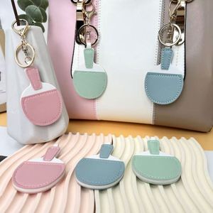 Breloque de sac en forme de raquette de ping-pong, mignonne, en cuir PU, porte-clés raquette de tennis de table, couleur macaron, pendentif souvenir sportif - Product Image 1