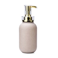Récipient vide en plastique biodégradable de paille de blé écologique contenant cosmétique de fournitures d'hôtel avec pompe à shampoing de luxe en or