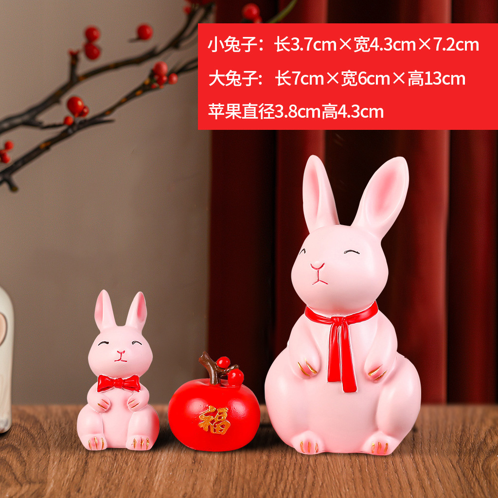 Conejo Rosa y un Par de Manzanas