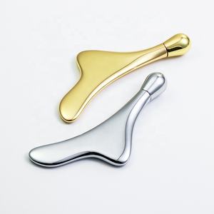 Lüks 24k altın Gua Sha masaj değnek kaldırma yüz kaldırma ve sıkma yüz özellikleri göz bakımı rulo dahil - Product Image 1