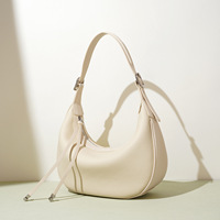 Sac fourre-tout décontracté en cuir véritable pour femme 2026 avec fermeture éclair, étanche, capacité 1-1,9 L, poignée souple, design simple et original