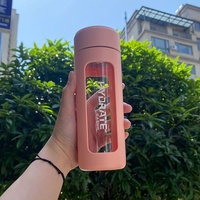 Bouteille d'eau en verre borosilicaté à haute teneur en borosilicate avec filtre et couvercle en plastique