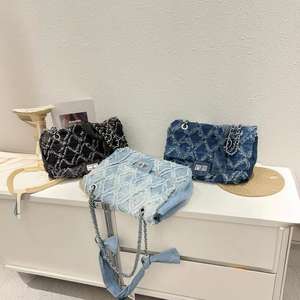 กระเป๋าผู้หญิงแบบใหม่สำหรับฤดูใบไม้ผลิและฤดูร้อนกระเป๋าผ้าเดนิมสายโซ่กระเป๋าสัมภาระสัมภาระทรงสี่เหลี่ยมขนมเปียกปูนความจุขนาดใหญ่2025เดินทางกระเป๋าสะพายข้าง - Product Image 1