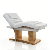 Nouvel arrivage de meubles de salon Base de grain de bois blanc Lit facial de spa de beauté Lit médical de cils de massage inclinable électrique à 4 moteurs