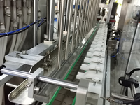 Machine de remplissage de liquides semi-automatique électrique pneumatique à pompe motorisée, contrôlée par PLC, pour bouteilles en verre de grande taille