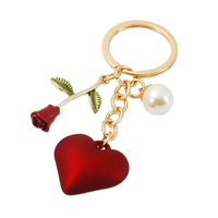 Cadeau romantique pour la Saint-Valentin, élégant porte-clés pendentif macaron pour femme, en alliage métallique durable, rose lumineuse, accessoire de sac