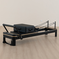 Lit de Pilates pour usage commercial en studio de fitness, équipement de Pilates en alliage d'aluminium solide blanc et noir, Reformer de Pilates