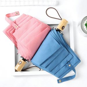Nouvelle tendance, style simple, parapluie compact pliable en 3 sections avec poignée en bois massif, coupe-vent et imperméable, idéal pour la publicité - Product Image 4