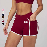 Shorts de sport pour femme personnalisés, haute respirabilité, séchage rapide, extensibles dans quatre directions, color block, ajustés, effet ventre plat, anti-transpiration