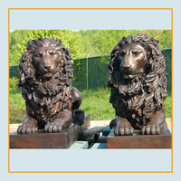 Paire de sculpture grandeur nature de lion de jardin en bronze de gardien coulé en cuivre à vendre