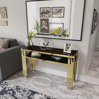 Table console moderne de luxe avec base en acier inoxydable doré et miroir en verre pour la maison ou l'hôtel
