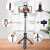 Vente en gros Trépied sans fil Bâton à selfie avec lumière LED pour selfies de téléphone et supports de téléphone