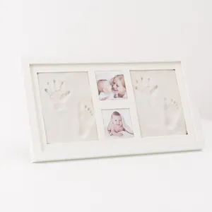 A solid wood photo frame set box for expectant mothers and new mothers about their baby's hand and foot prints