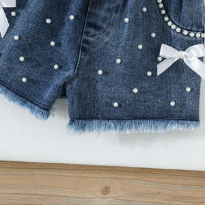 Completo Estivo per Ragazze in Stile Europeo e Americano, T-shirt Bianca Senza Maniche con Volant, Perle e Fiocchi, <span class=keywords><strong>Shorts</strong></span> in Denim, Set 2 Pezzi - Product Image 6