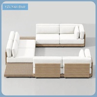 Ensemble de canapés en teck d'extérieur avec canapé en forme de L personnalisable et table basse de style nordique pour villas, hôtels et complexes hôteliers
