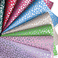 Support durable de motif laser en cuir synthétique imprimé léopard coloré pour une utilisation décorative sur les sacs de voitures de meubles