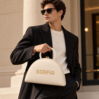 Nouveaux designs de sacs à main pour hommes promotionnels, sacs à main en cuir PU à motif personnalisé, poignée arquée durable, fabrication OEM ODM directe d'usine