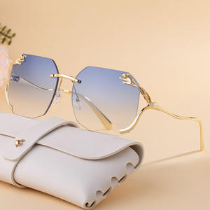 Gafas de sol de lujo sin montura para mujer, patillas de metal dorado, protección UV400, estilo Instagram, lentes de policarbonato, gafas de sol clase 2 - Product Image 1