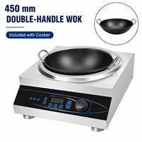 Cuisinière à induction commerciale concave 220V 3.5kW 5kW avec wok de 450mm à double poignée pour cuisson à la poêle