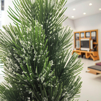 Plante artificielle en plastique vert luxuriant avec but de décoration de salon