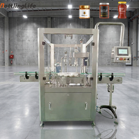 Machine de bouchage haute vitesse pour sauces, sauces piquantes, sauces à salade et pâtes à tartiner au chocolat, pour bouteilles et bocaux en verre, avec élévateur de bouchons