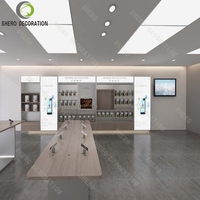 Vitrine de présentation de mobilier de magasin de téléphonie mobile au design moderne personnalisé pour boutique de téléphones