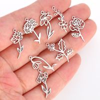 Pendentif en acier inoxydable motif fleur du mois de naissance, breloque florale creuse pour la fabrication de bijoux, breloque de collier étanche pour femme