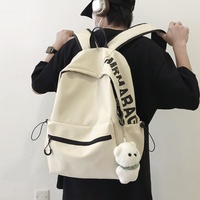 Sac à dos unisexe léger en denim au design tendance pour étudiants et lycéens, avec fermeture éclair et doublure en polyester