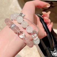 Bracelet de luxe de haute qualité pour femme, élégant, fait main, avec perles roses transparentes et accent étoile, idéal pour les soirées