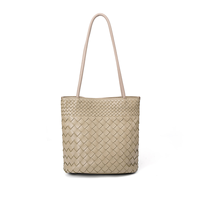 Sac seau décontracté sophistiqué en cuir véritable tressé, multi-compartiments, en peau de mouton, fourni par Bag Supplier