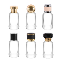 Flacon de parfum de luxe à bouchon à pression 30ml 50ml 100ml, flacon de Cologne rond en verre rechargeable avec boîte et pulvérisateur à pompe