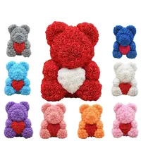 Meilleure vente : Ours en peluche rose artificiel avec fleurs en PE de 25 cm et boîte cadeau transparente
