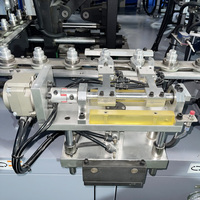 Máquina Sopladora de Botellas PET Totalmente Automática de Alta Producción, Dos Cavidades, Controlada por PLC, Componentes SMC, Motor y Rodamientos