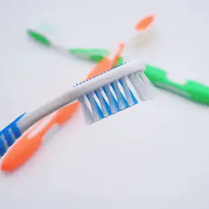 Wholesale Orange Blue Green Anti-slip Soft Bristle Tooth Brush Teeth Cleaning Adult Toothbrush