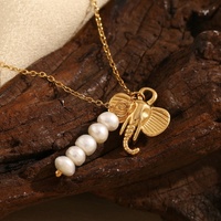 Collier pour femme avec pendentif éléphant en acier inoxydable plaqué or 18 carats et imitation perle, nouveau design