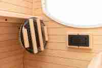 Cabine de sauna moderne pré-assemblée prête à l'emploi, avec fonction d'ions négatifs et support en bois massif de pruche, pour une expérience de sauna infrarouge lointain.