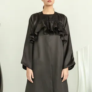 2024 U.シックな新しいデザインOEMブラックグレース女性ビーズソリッドアバヤドバイドレスヒジャーブフリル女性イスラム教徒の服