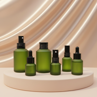 Bouteille en verre borosilicate personnalisable en forme d'épaule pour sérum de soin de la peau. Pompes pulvérisatrices compatibles avec les couvercles. Capacités multiples