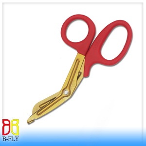 Ciseaux à pansements B-FLY, manche rouge, lame dorée, instrument chirurgical manuel EMT, classe I - Product Image 1