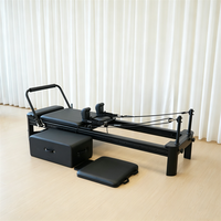 Vente en gros : Lit de Pilates Reformer à rail complet en aluminium noir mat, avec logo personnalisé, équipement d'entraînement de gym