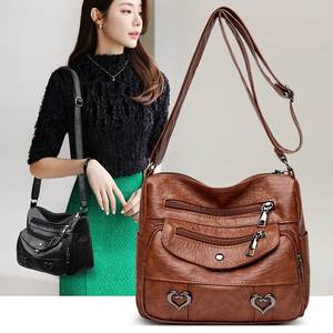 Sac à bandoulière pour femme tendance avec fermeture éclair et chaînes décoratives, grande capacité, en cuir - Product Image 2