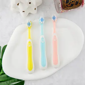 OEM Small Cute Handle Kids Toothbrush Rubber Covered Soft PBT Bristle Light Children Toothbrush