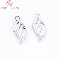 Vente en gros de pendentifs en laiton plaqué or champagne 24 carats de haute qualité, en forme d'ailes d'ange, tendance, pour la fabrication de bijoux DIY de haute qualité