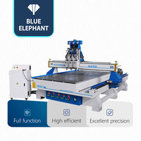Machine de gravure CNC 1530 à trois têtes et trois broches à prix abordable pour le bois, le contreplaqué, les portes et le mobilier